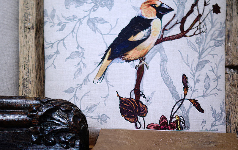 detail floral carving and goldfinch print for wall-paneling